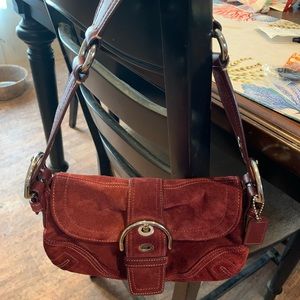 Small coach handbag with bucket detail